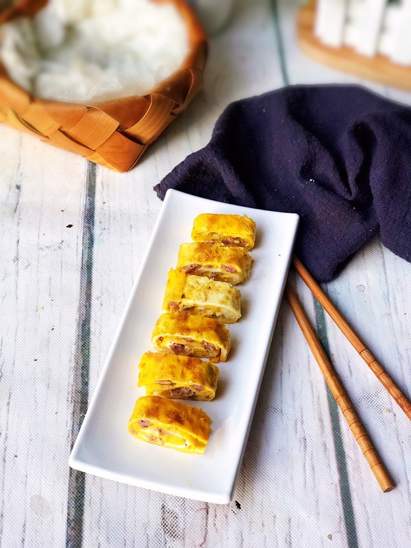 香腸雞蛋卷的做法-咸鮮味煎菜譜-易網(wǎng)健康養(yǎng)生網(wǎng) 香腸雞蛋卷的做法-咸鮮味煎菜譜
