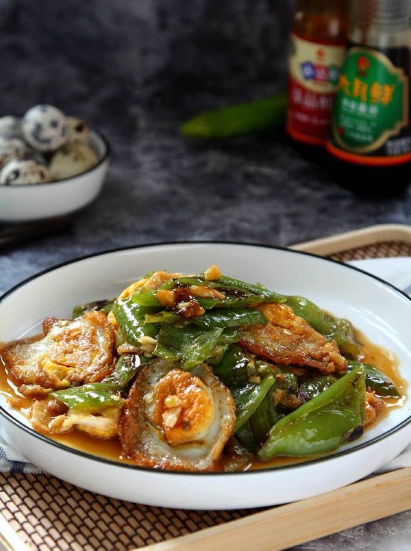 虎皮尖椒鵪鶉蛋的做法-咸鮮味煮菜譜-易網(wǎng)健康養(yǎng)生網(wǎng) 虎皮尖椒鵪鶉蛋的做法-咸鮮味煮菜譜