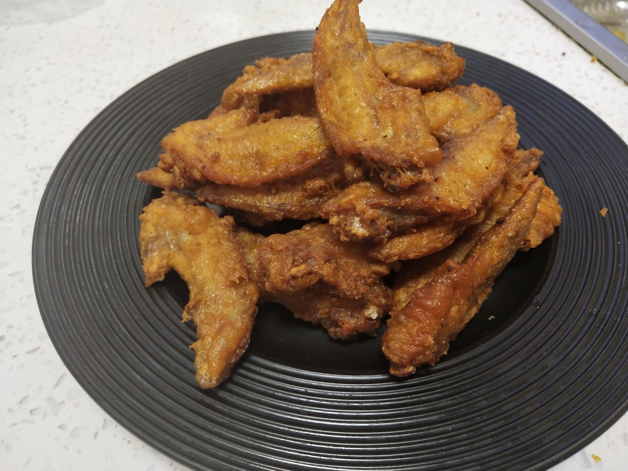 飄香酥炸雞翅尖的做法-家常味炸菜譜-易網健康養生網 飄香酥炸雞翅尖的做法-家常味炸菜譜