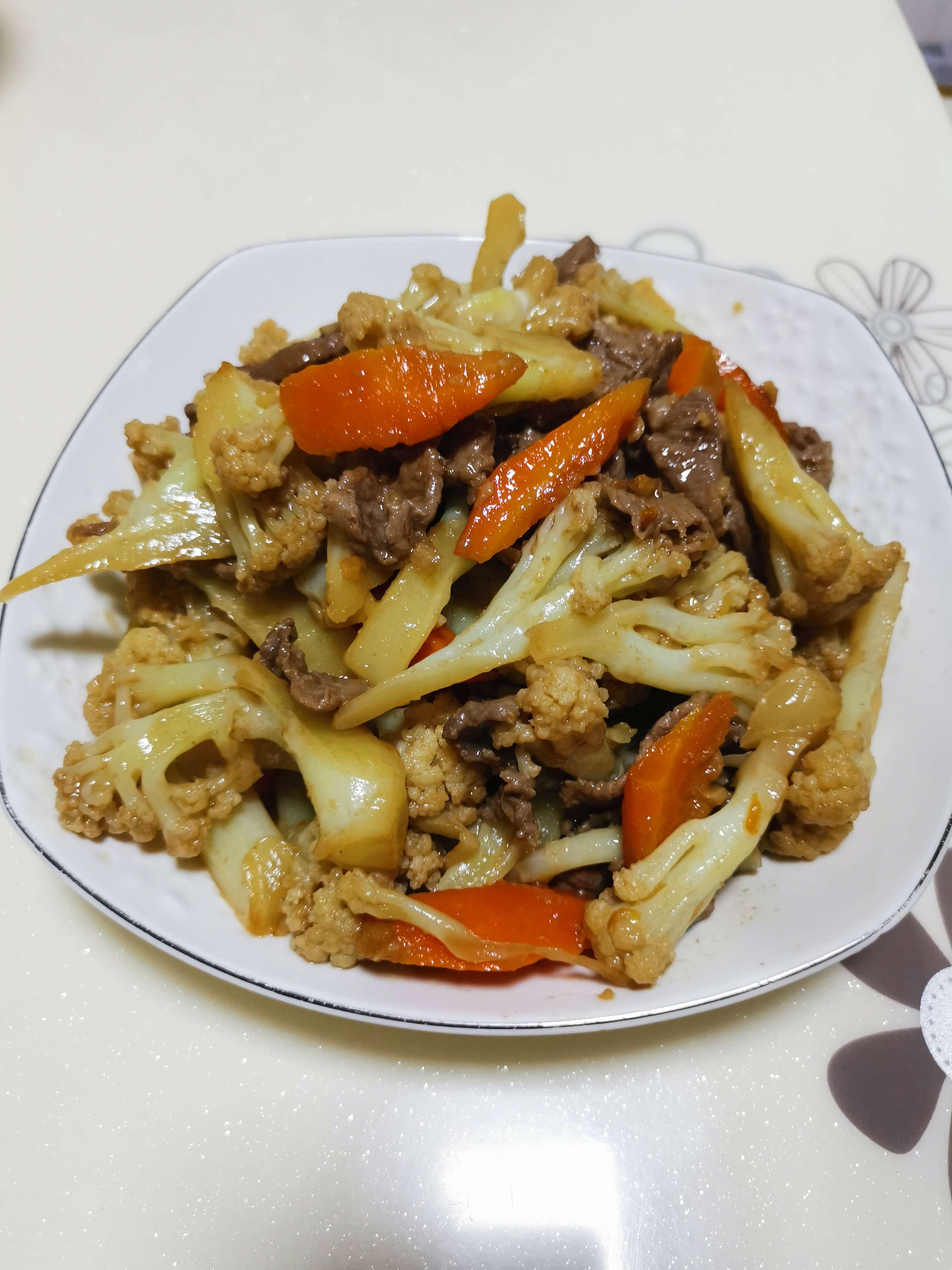 胡蘿卜花菜炒牛肉的做法-家常味炒菜譜-易網健康養生網 胡蘿卜花菜炒牛肉的做法-家常味炒菜譜