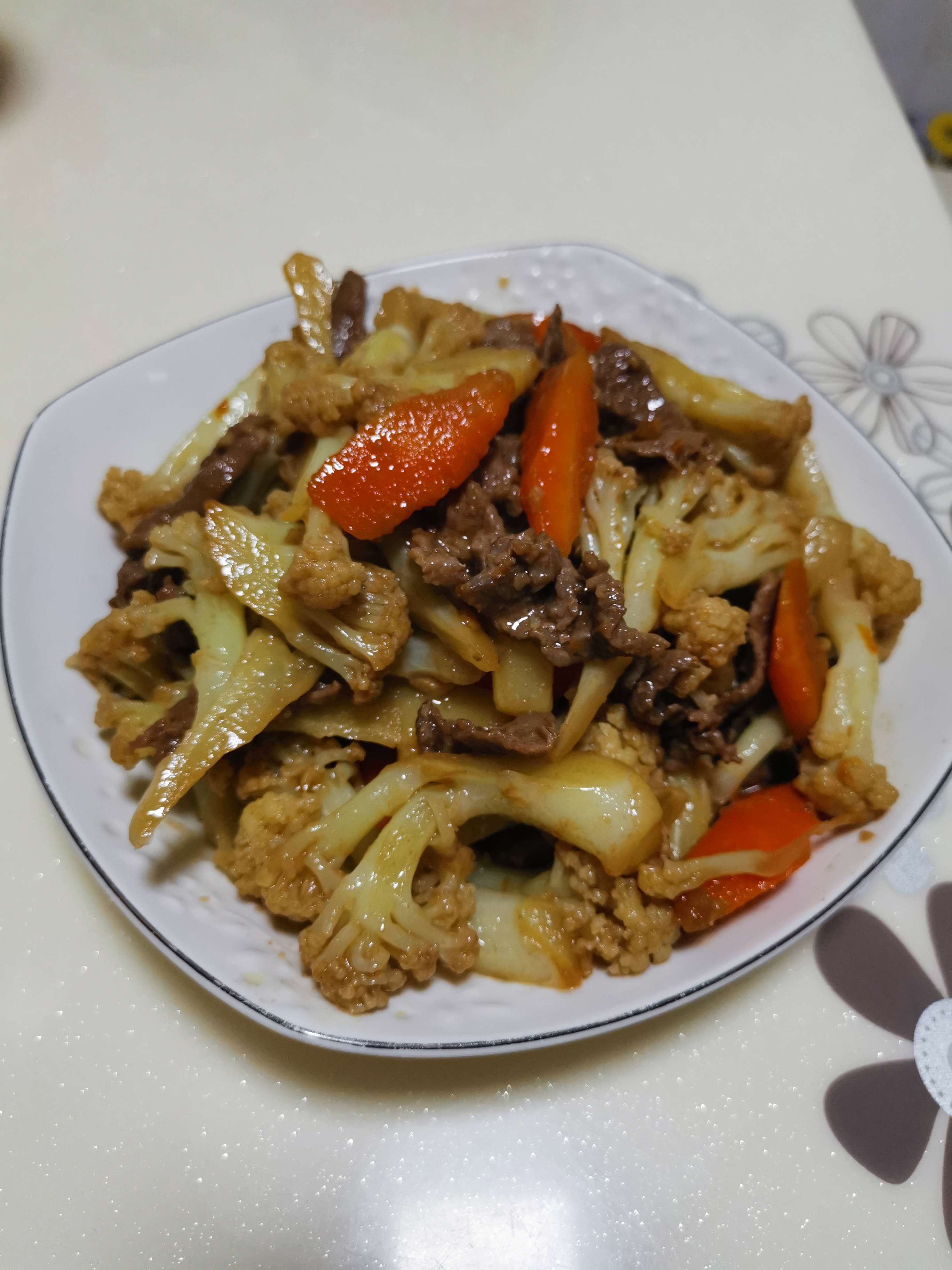 胡蘿卜花菜炒牛肉的做法-家常味炒菜譜-易網健康養生網 胡蘿卜花菜炒牛肉的做法-家常味炒菜譜
