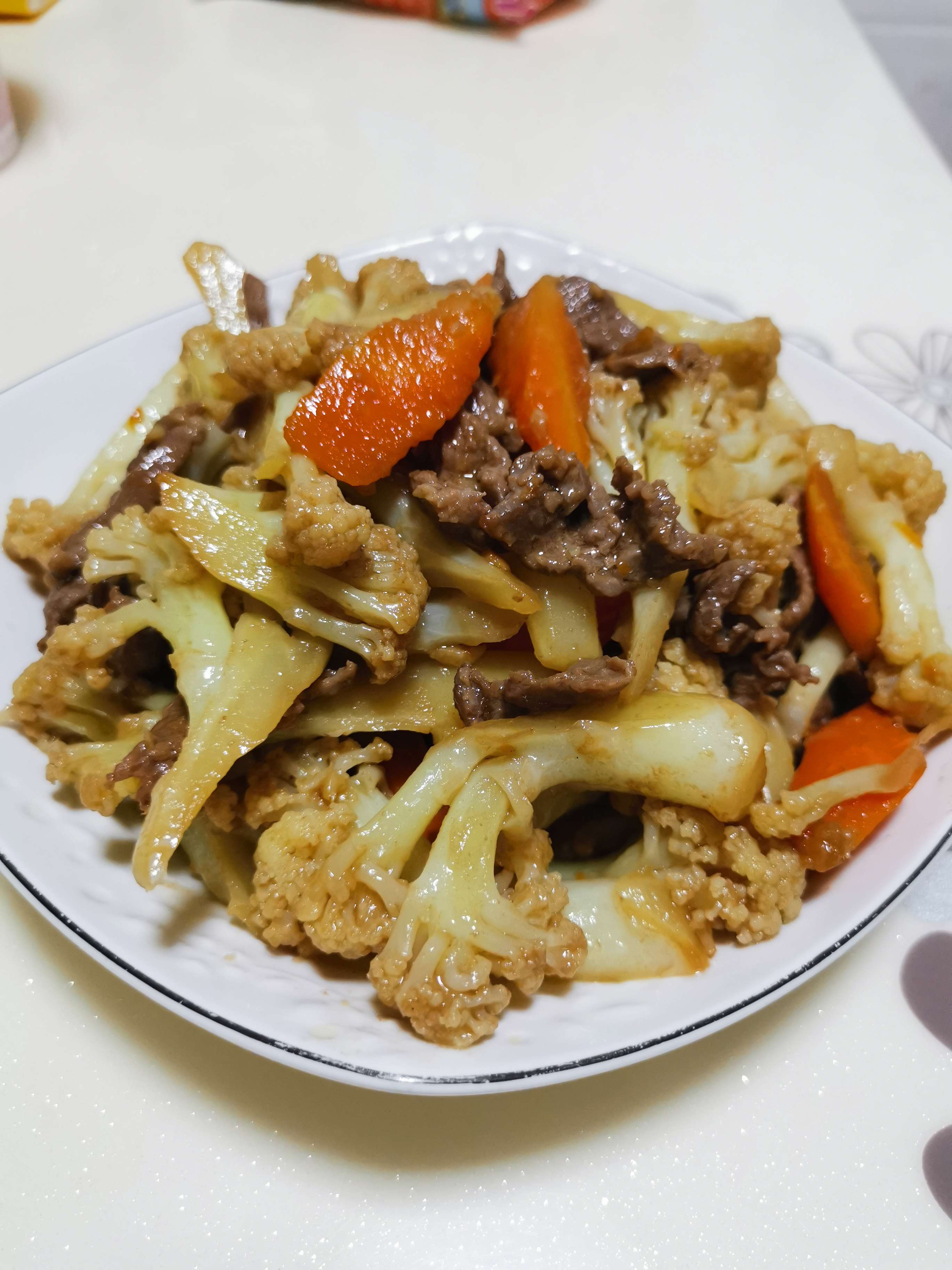 胡蘿卜花菜炒牛肉的做法-家常味炒菜譜-易網健康養生網 胡蘿卜花菜炒牛肉的做法-家常味炒菜譜